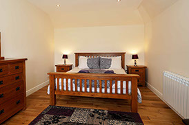 Culla Self Catering Cottage King Size Double Bedroom is spacious and modern with central heating and WIFI Internet Access